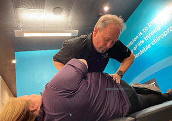 The Joint Chiropractic Port Hueneme Patient Adjustment