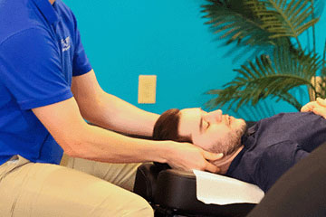 The Joint Chiropractic St. Lucie West Patient Adjustment