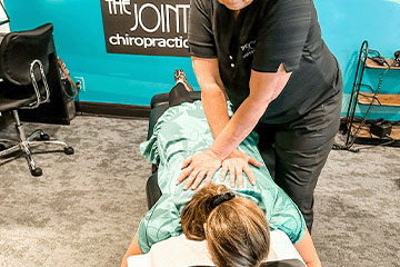The Joint Chiropractic Monroe Patient Adjustment 