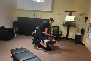 The Joint Chiropractic Short Pump Patient Adjustment