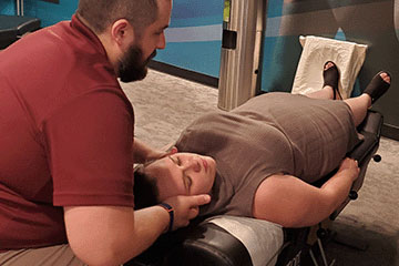 The Joint Chiropractic Kitty Hawk Patient Adjustment