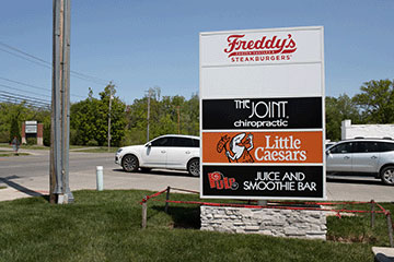 The Joint Chiropractic Lorain
is located next to Little Ceasars