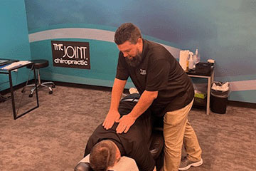 The Joint Chiropractic Cedar Hill Patient Adjustment 